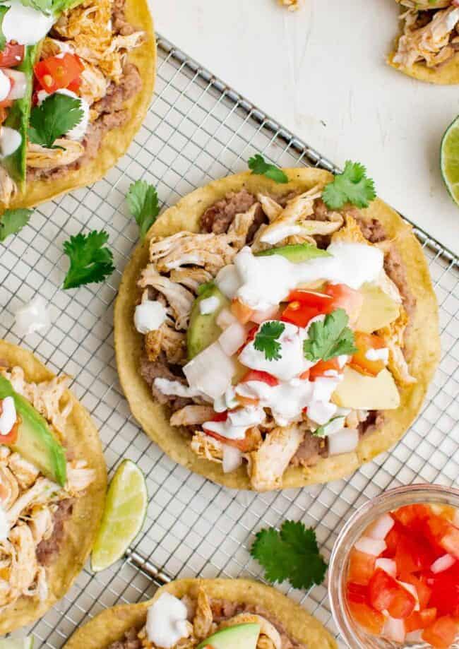 up close overhead image chicken tostadas on cooking rack