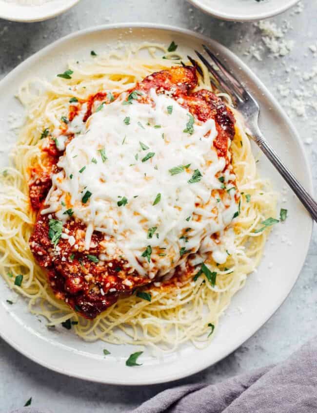 crockpot chicken parmesan on white plate