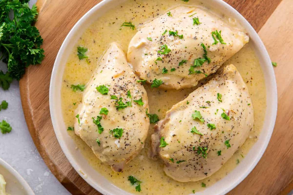 3 chicken breasts covered in a creamy ranch sauce.