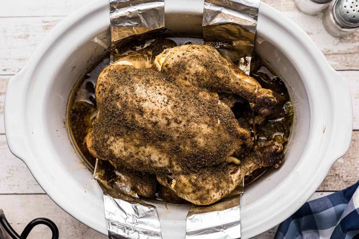 crockpot whole chicken prepped and cooked in crockpot