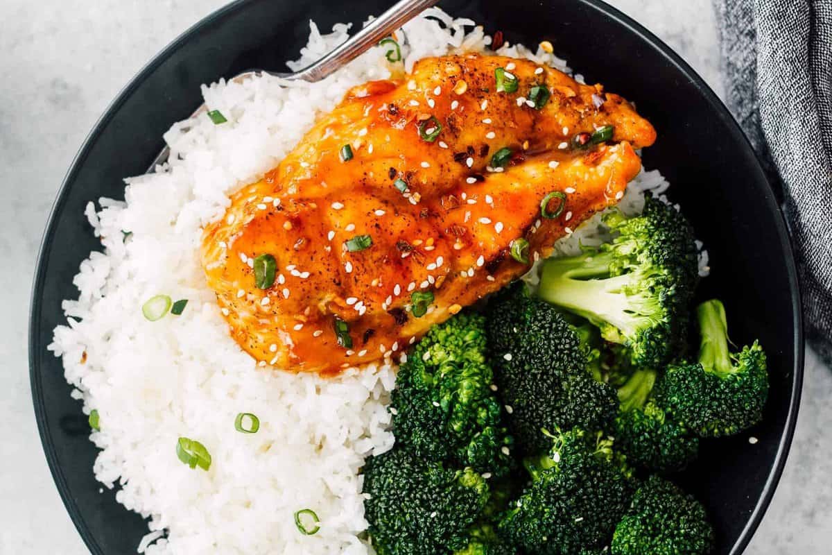 honey garlic chicken breast served with white rice and broccoli