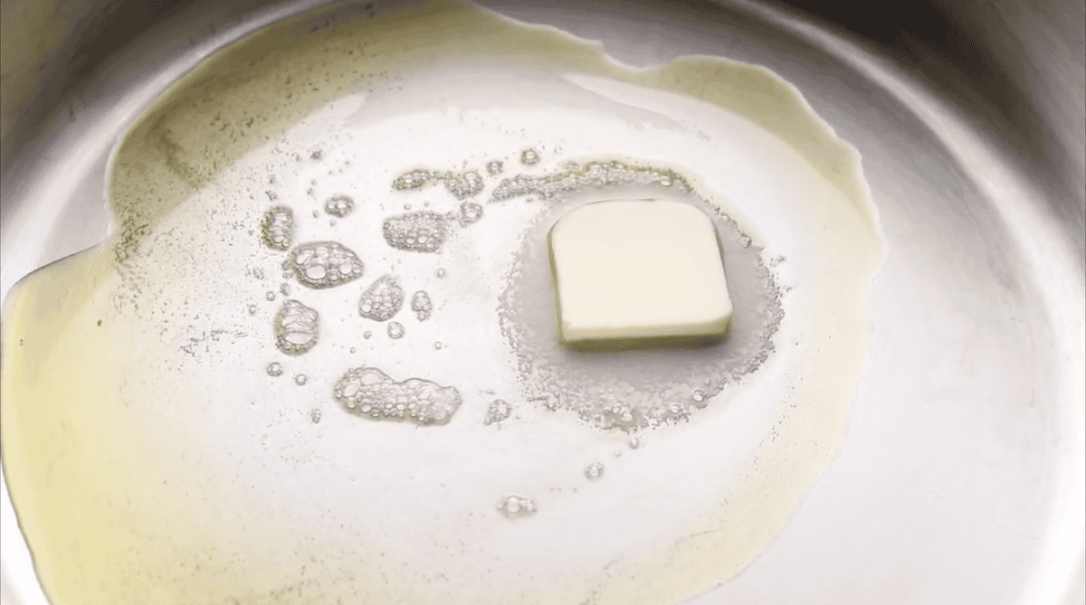 Butter and oil in a pan.