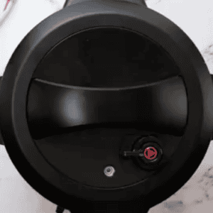 Overhead view of a pressure cooker with the lid on.