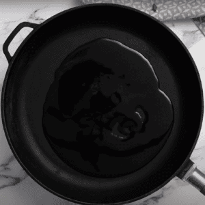 A skillet coated with olive oil.