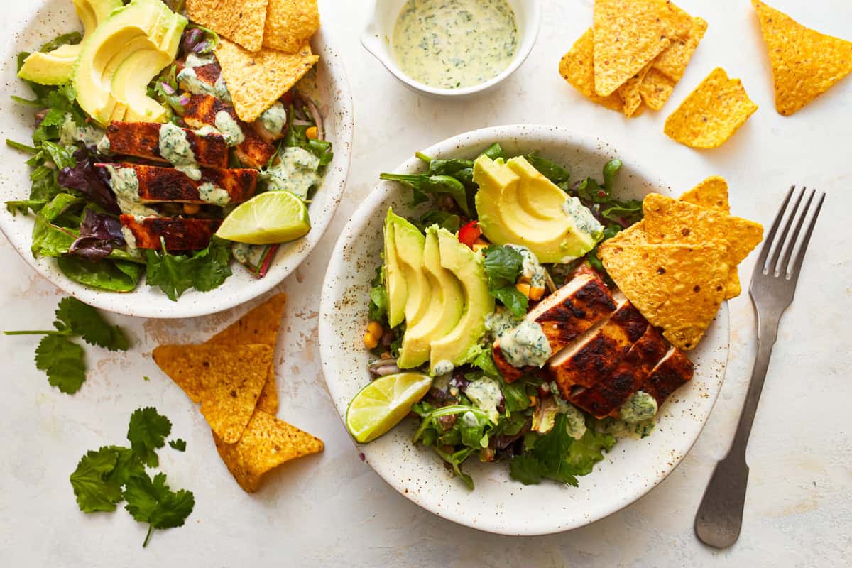 overhead view of bowls of santa fe chicken salad.