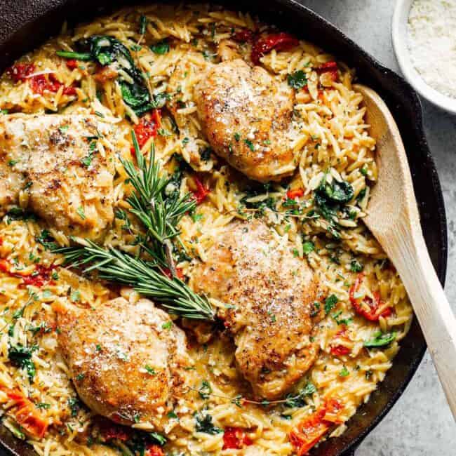 tuscan chicken or orzo in black skillet