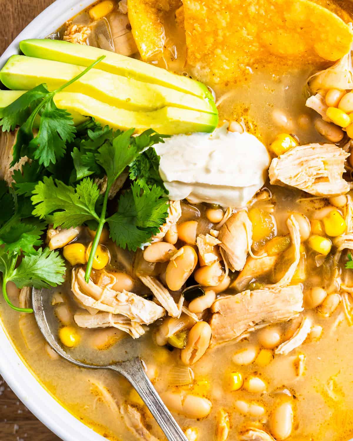 Close up on a bowl of white bean chicken chili.