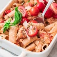 baked feta pasta with chicken in baking dish
