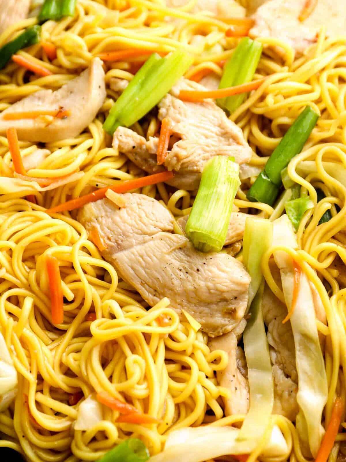 up close image of cooked chicken chow mein