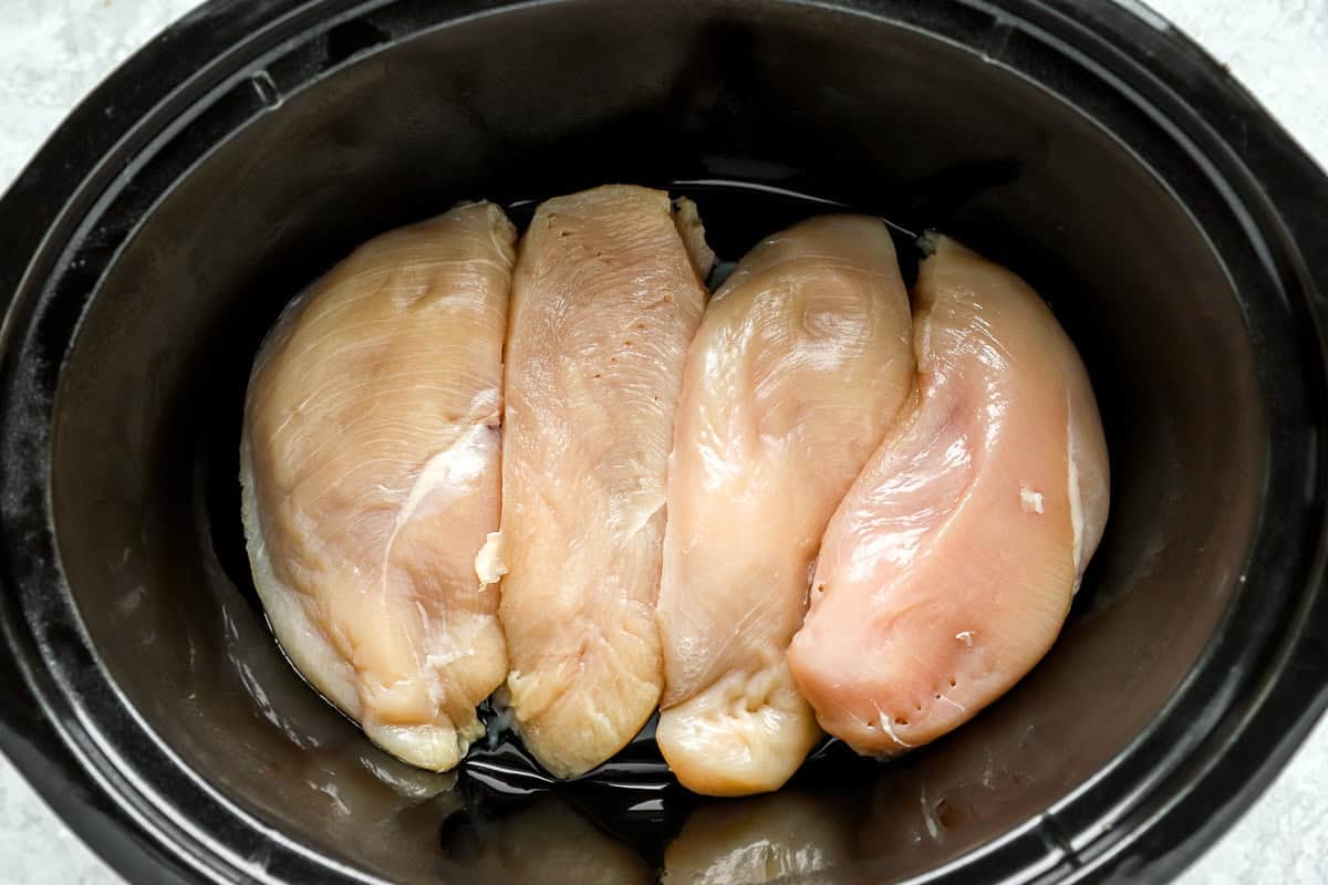 4 chicken breasts in a slow cooker.