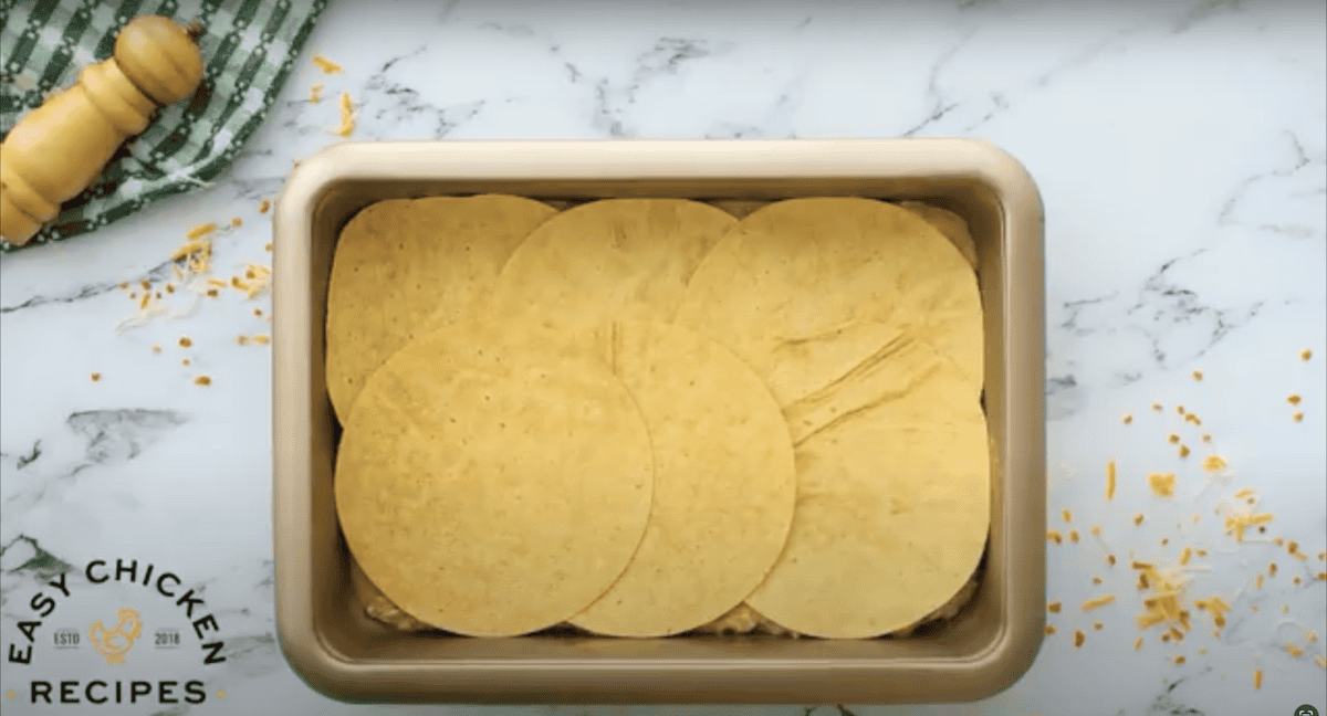 Tortillas layered on top.