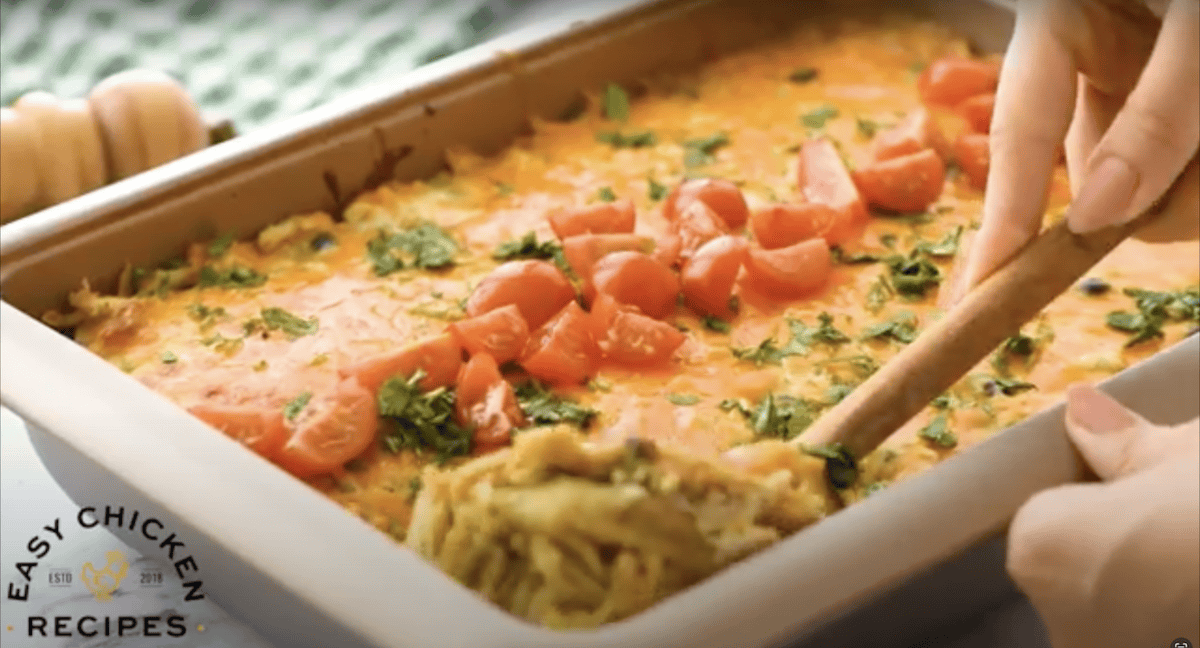 Scooping into green chile chicken casserole.