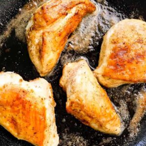 seared chicken breast in cast iron skillet