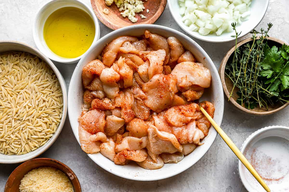 seasoned chicken pieces in a bowl.