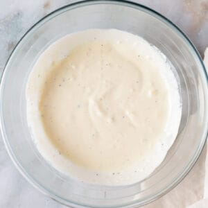 waldorf salad dressing in a glass bowl.