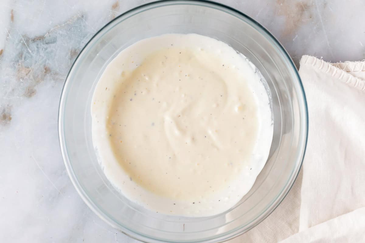 waldorf salad dressing in a glass bowl.