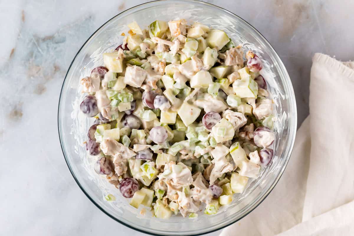 waldorf chicken salad in a glass bowl.