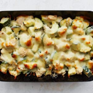 baked chicken zucchini casserole in a baking dish.