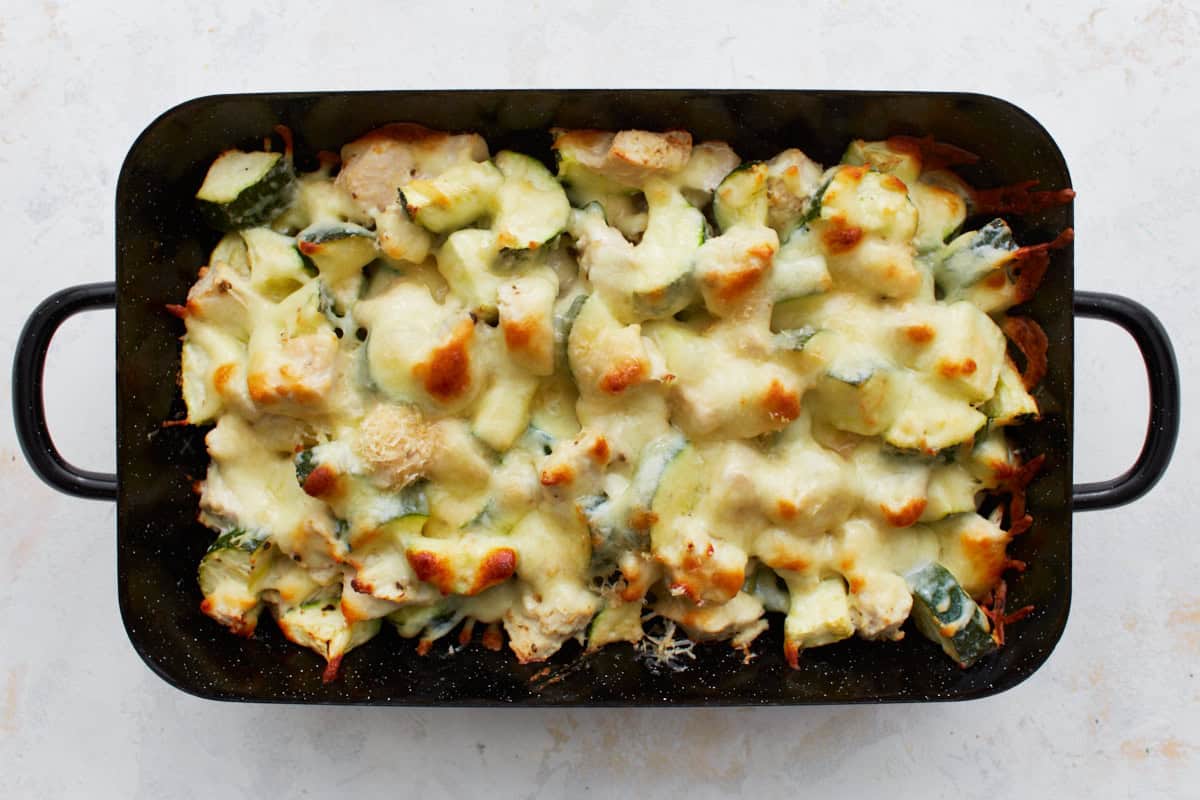 baked chicken zucchini casserole in a baking dish.