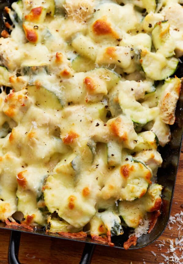 closeup view of chicken zucchini casserole in a baking dish.