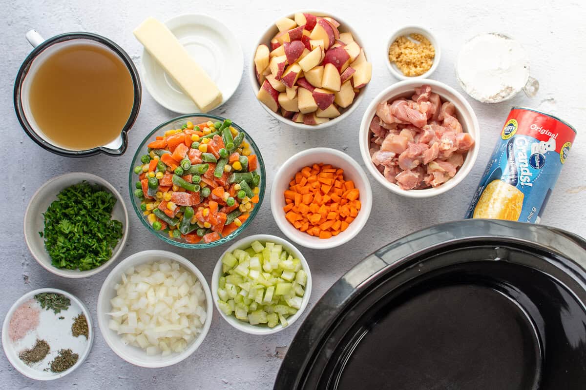 Ingredients for Crockpot chicken pot pie with biscuits.