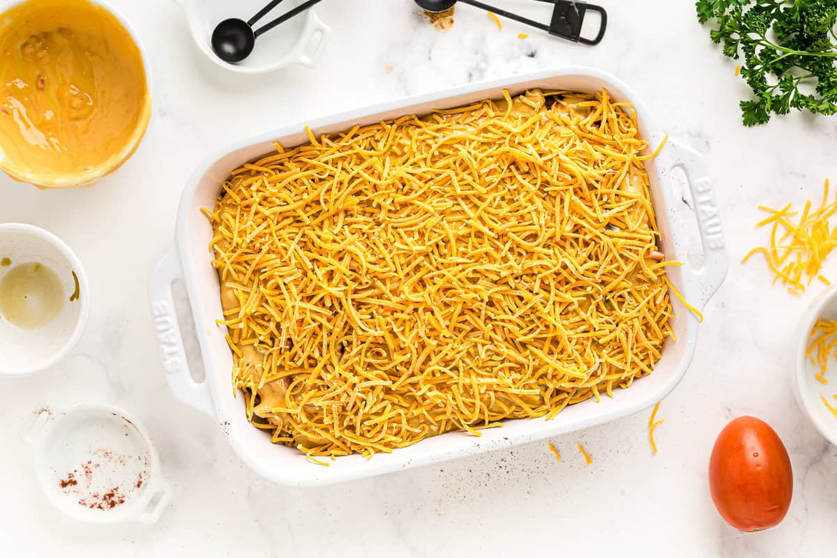 Dish topped with shredded cheese.