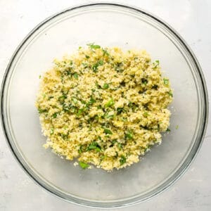 seasoned breadcrumbs in a glass bowl.