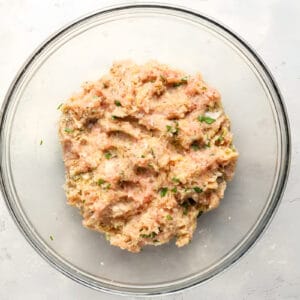 chicken patty mixture in a glass bowl.