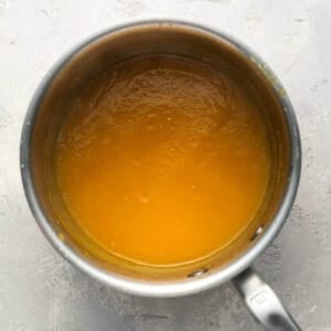 mango habanero wing sauce in a saucepan.