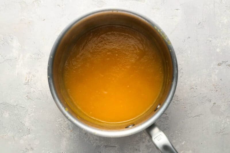 mango habanero wing sauce in a saucepan.