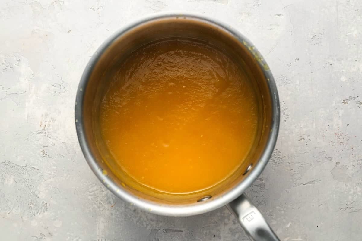 mango habanero wing sauce in a saucepan.