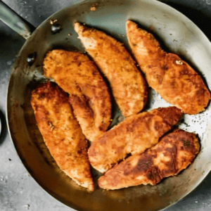 Pan-fried chicken tenders.