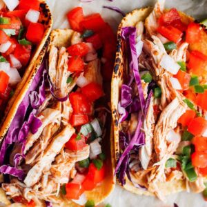 up close prepared instant pot chicken tacos in a row