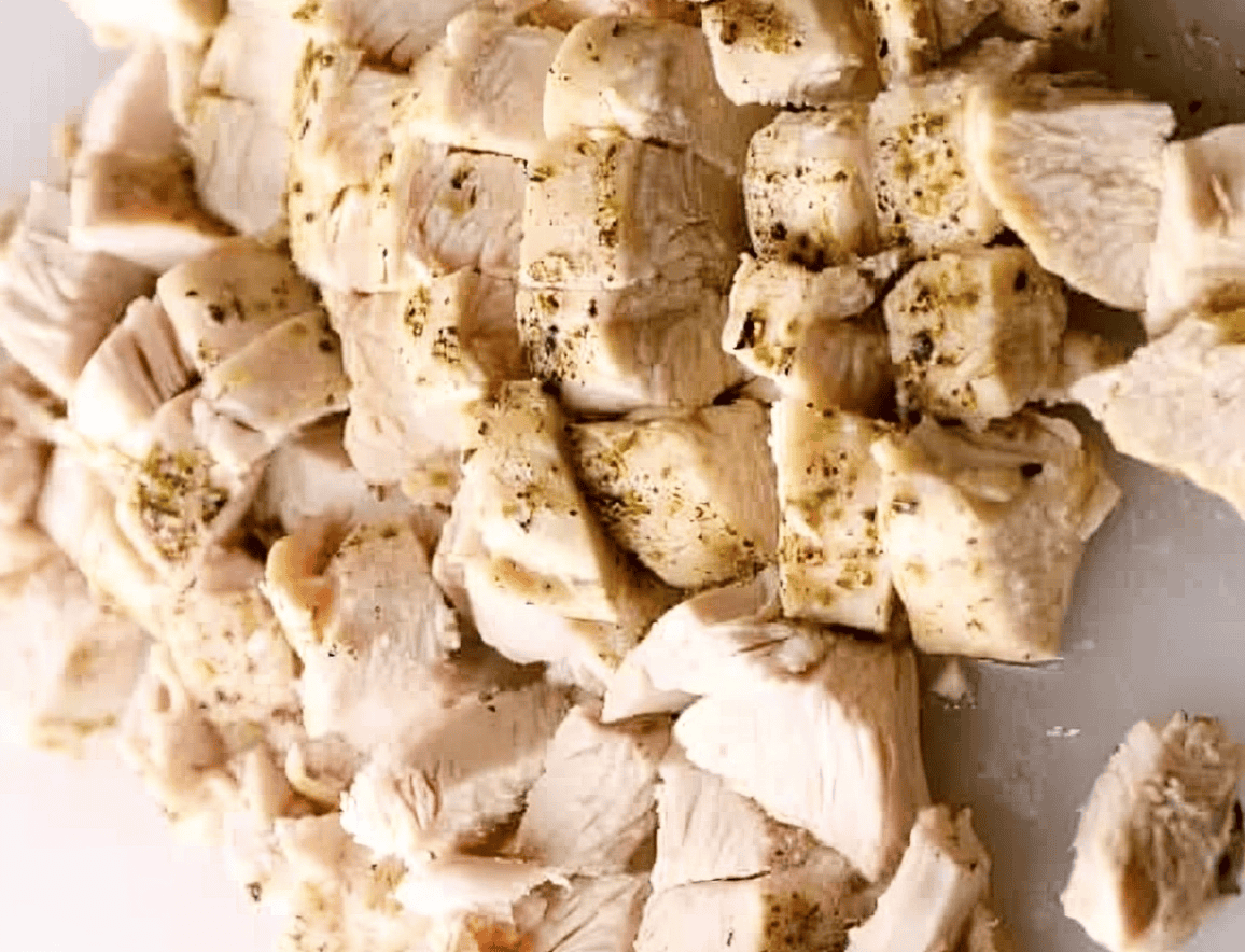 Cubes of cooked chicken.