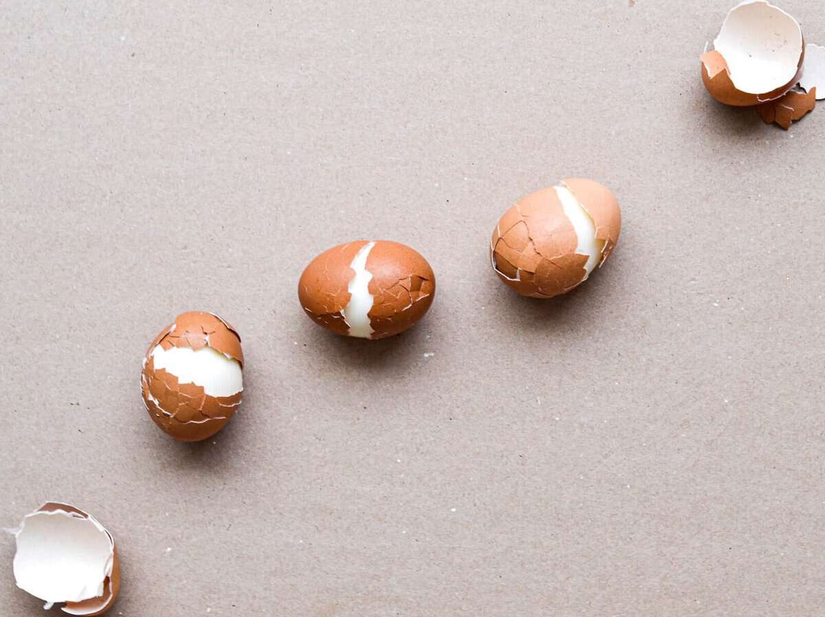 a group of hard boiled eggs on a surface.