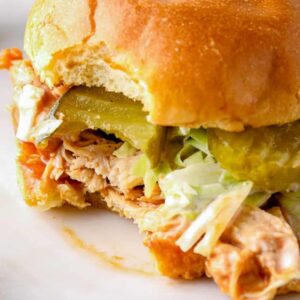 bite out of shredded bbq chicken sandwich