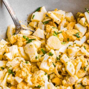 Homemade egg salad made with scrambled eggs and chives.