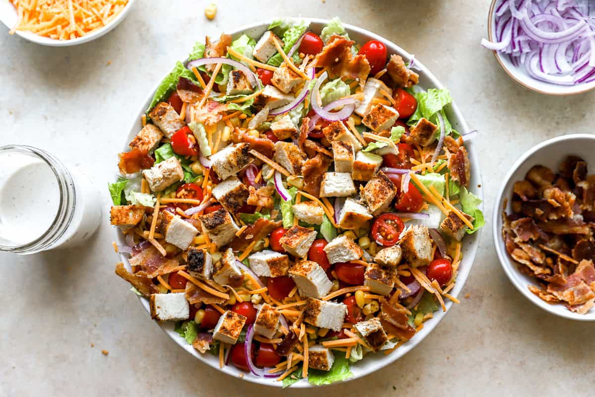 Chopped salad with chicken in a large bowl.