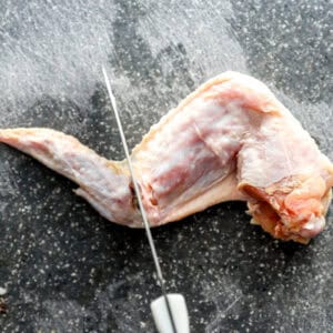 separating a raw wing tip from a wingette.