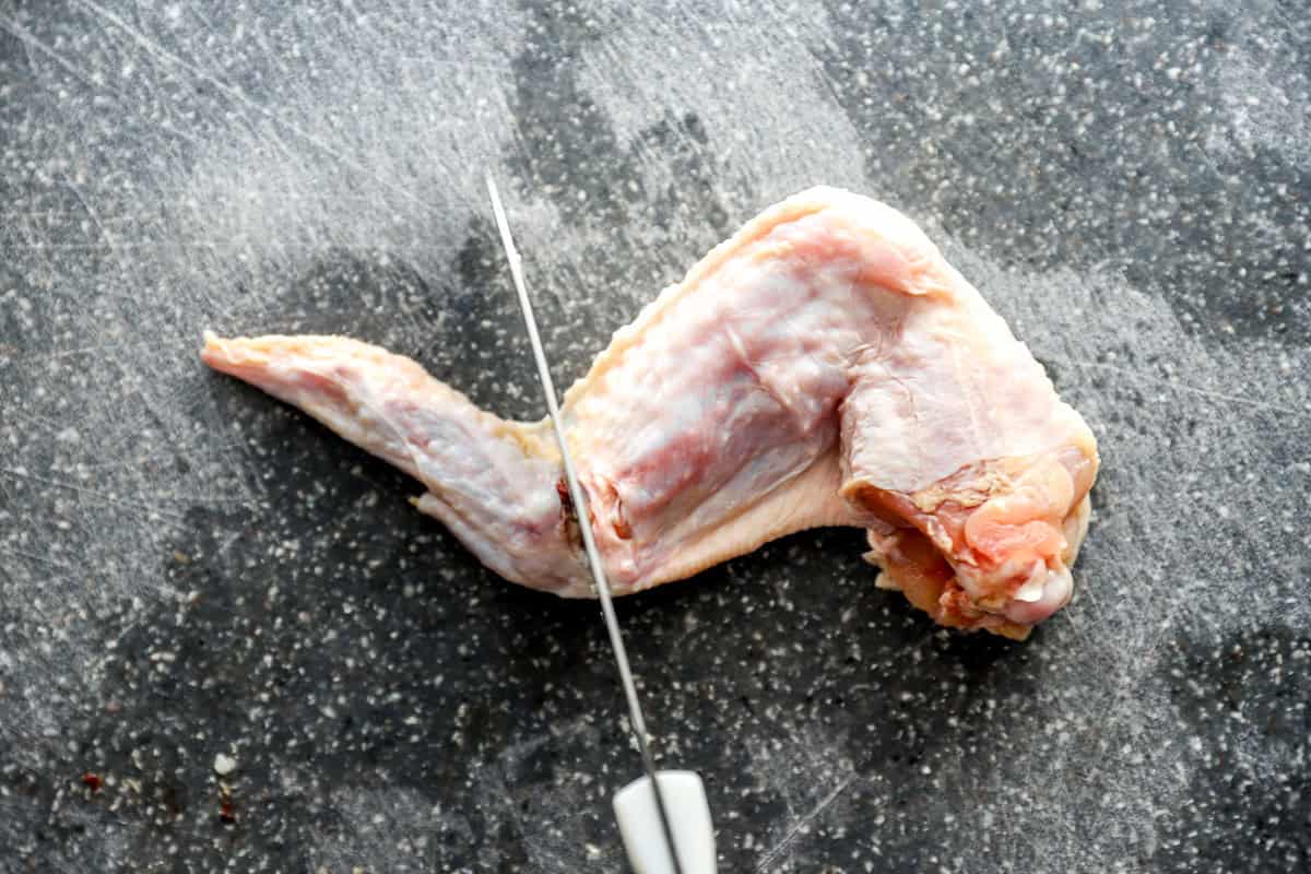 separating a raw wing tip from a wingette.