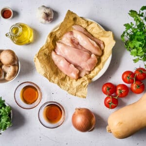 measured ingredients for sheet pan chicken tenders and veggies.