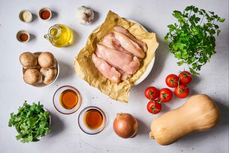 measured ingredients for sheet pan chicken tenders and veggies.