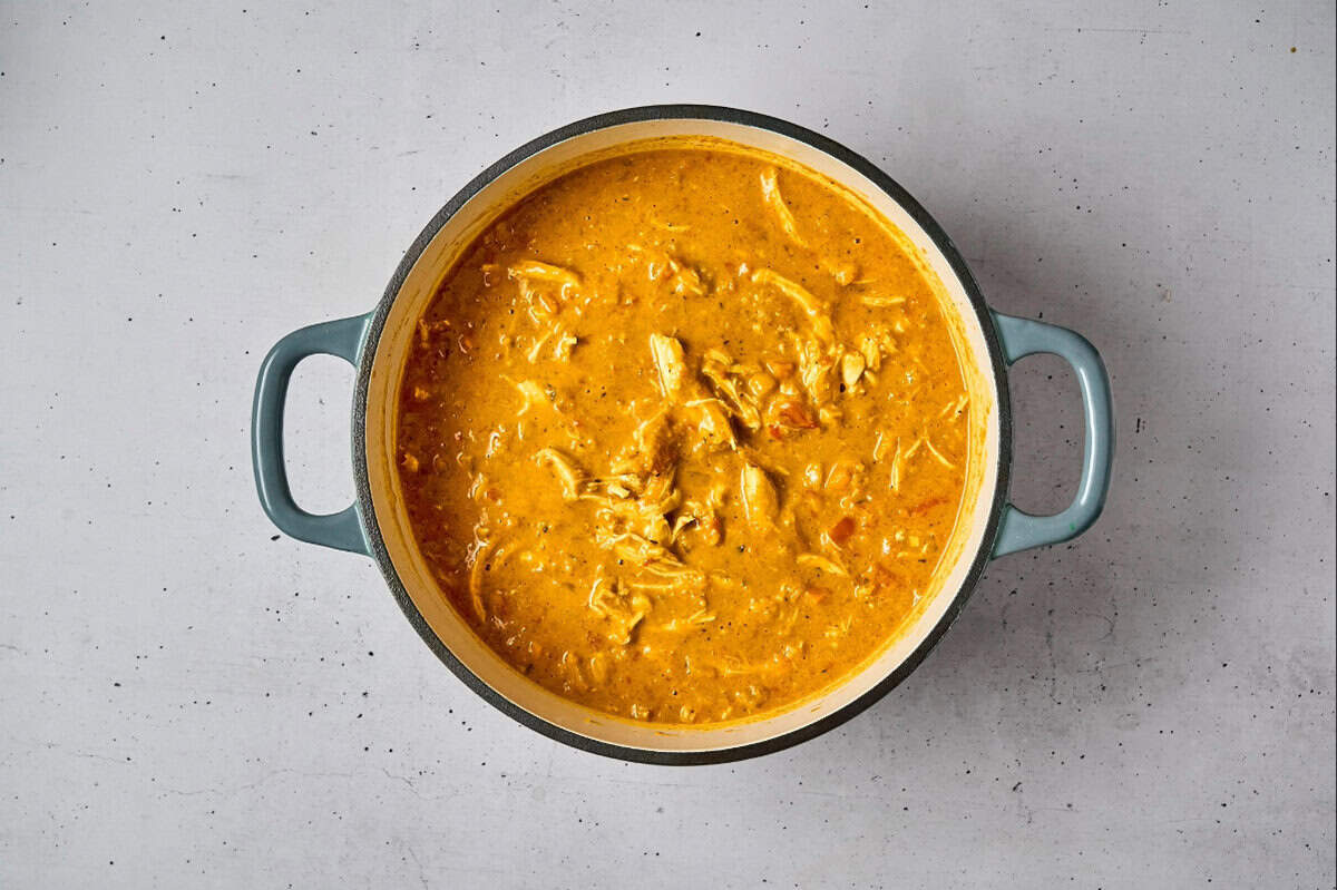 chicken mulligatawny soup in a dutch oven.