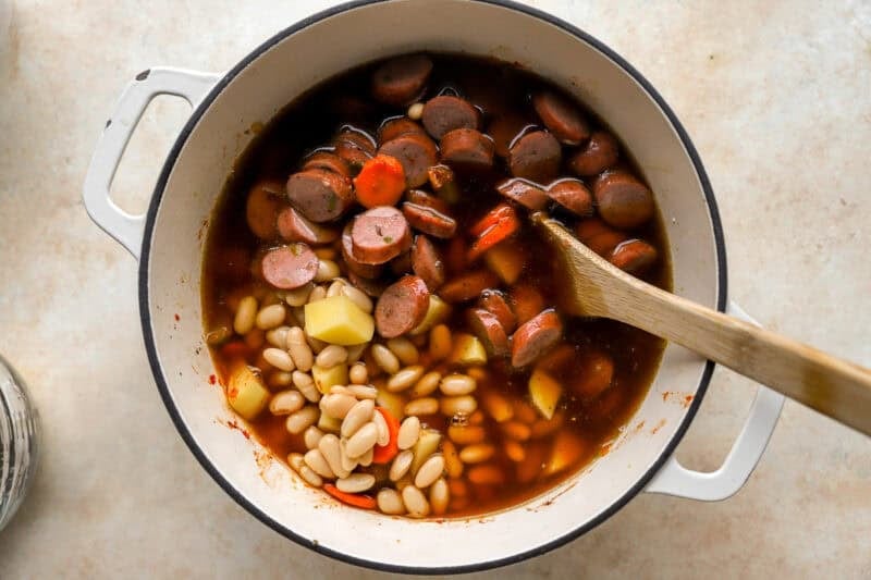 chicken sausage soup in a pot.