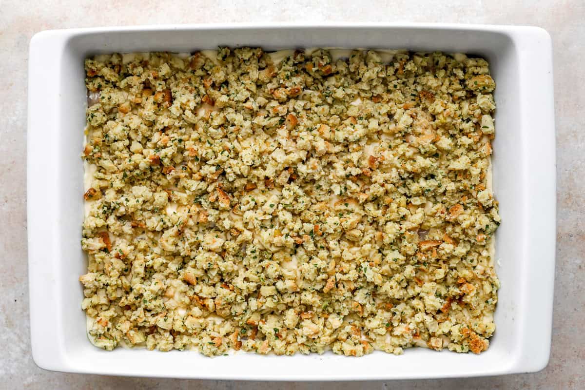 stuffing mix over chicken casserole in a baking dish.