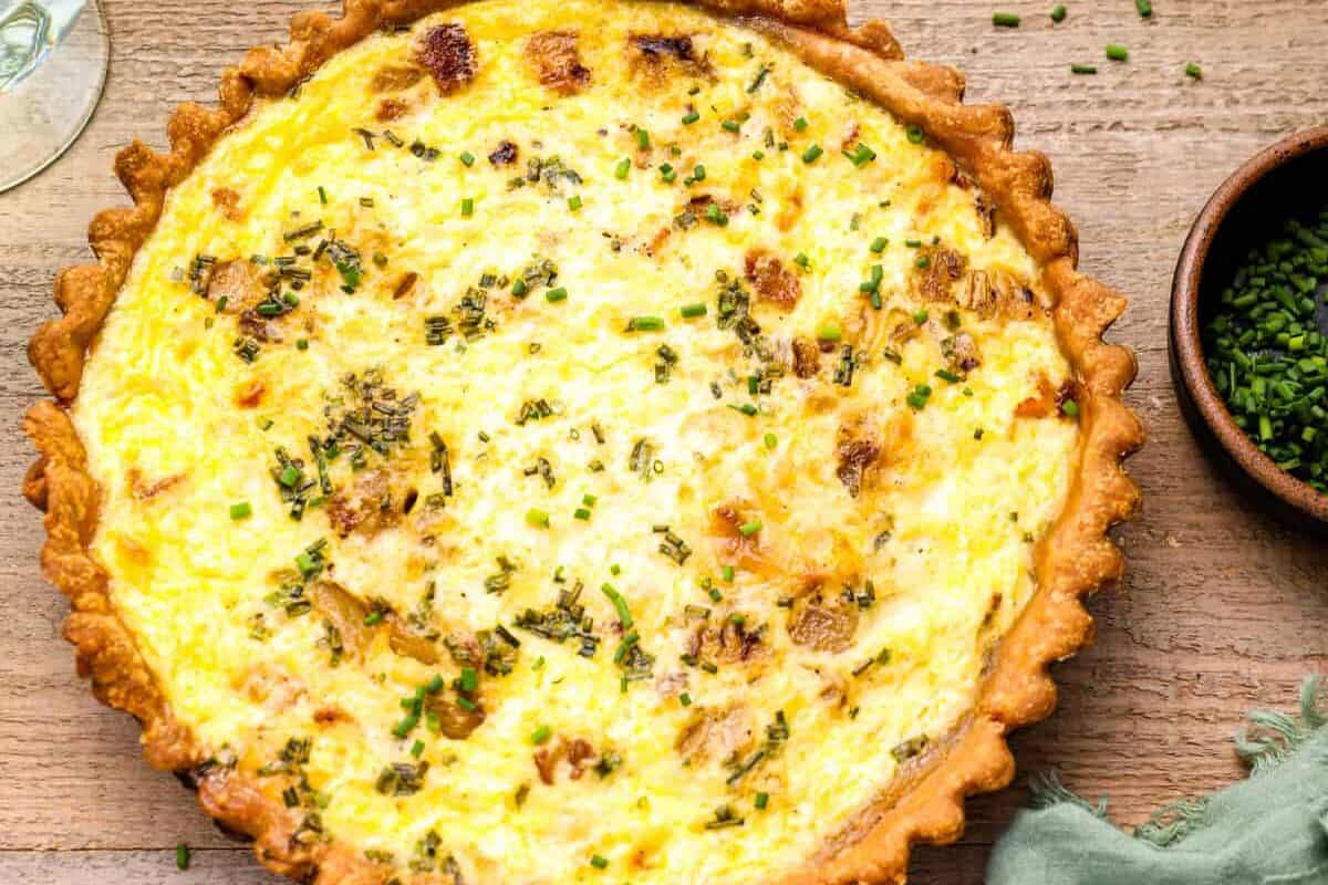 quiche Lorraine at the center of a tablescape