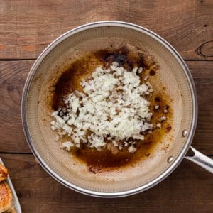 sauteeing onions in a skillet.