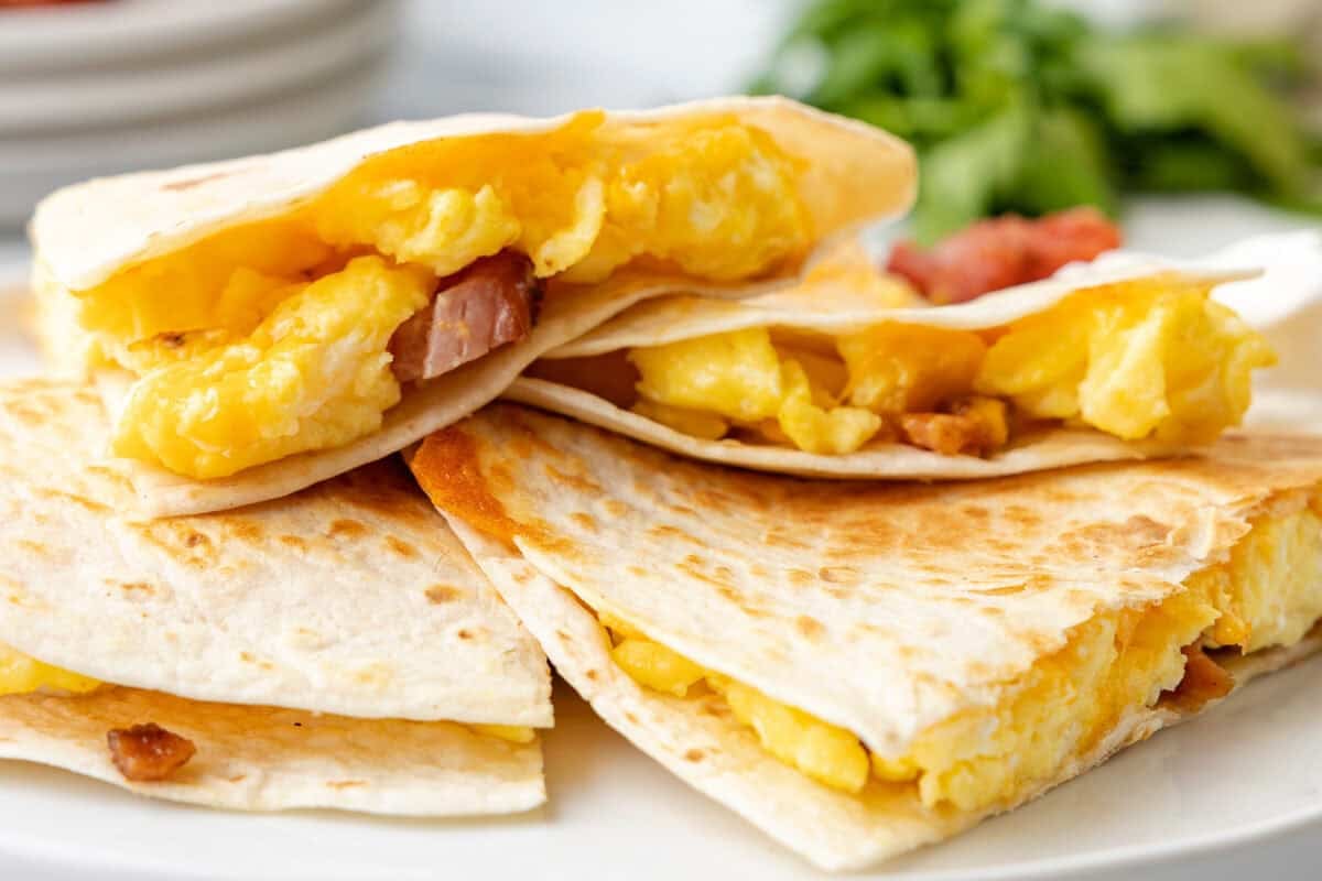 breakfast quesadillas filled with egg, bacon, and cheese.