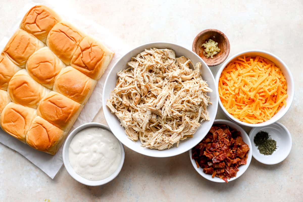 portioned ingredients for chicken bacon ranch sliders in individual containers.