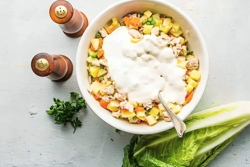 Chicken, potato, and veggie mixture topped with a creamy dressing.